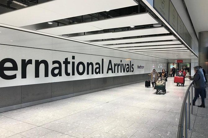 The International Arrivals sign inside a Heathrow terminal